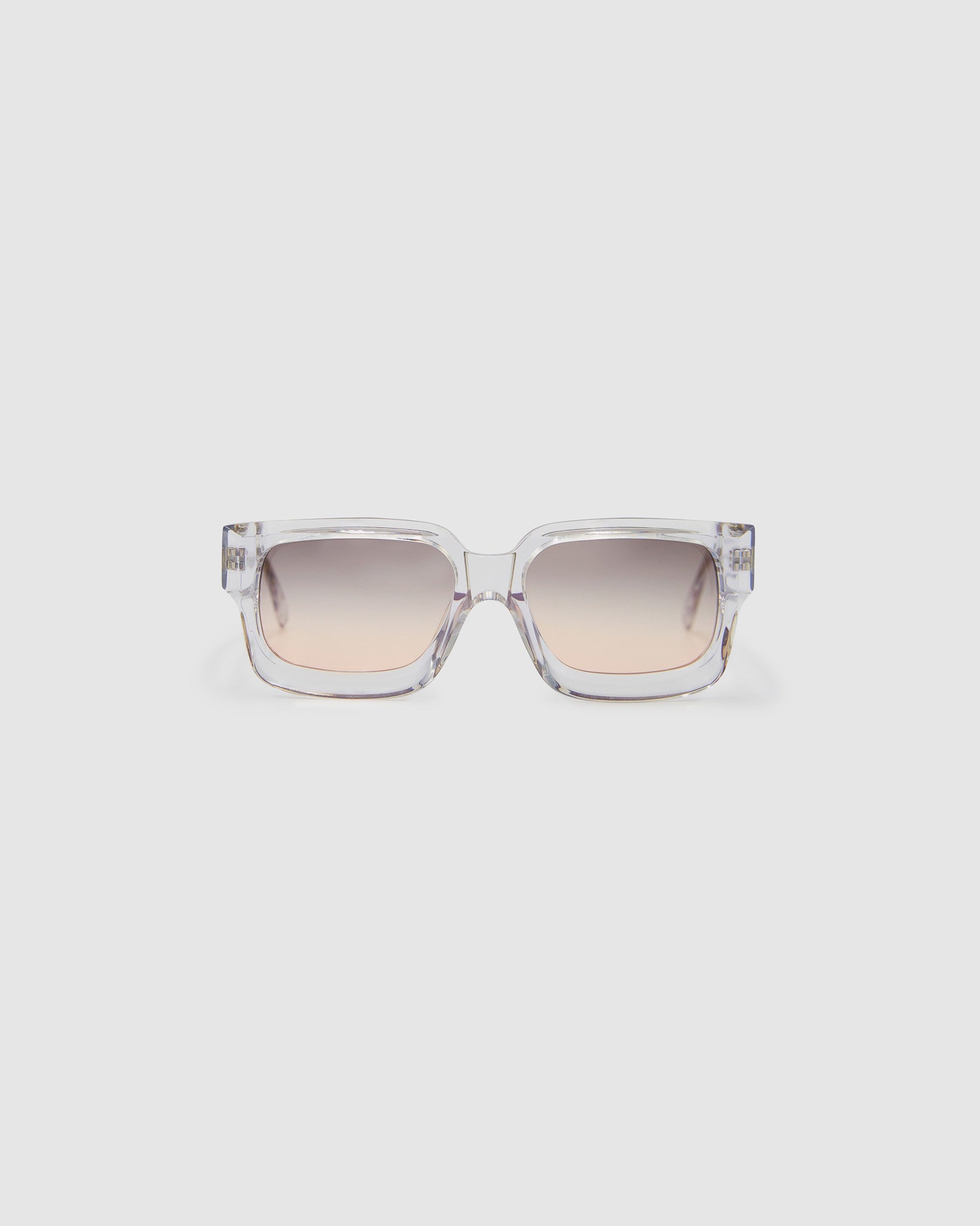 Brutal 3.0  Sunglasses by Tribu Eyewear — Crystal square acetate frame, dusk lens, front view light grey background.