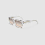 Brutal 3.0  Sunglasses by Tribu Eyewear — Crystal square acetate frame, dusk lens, side view light grey background.