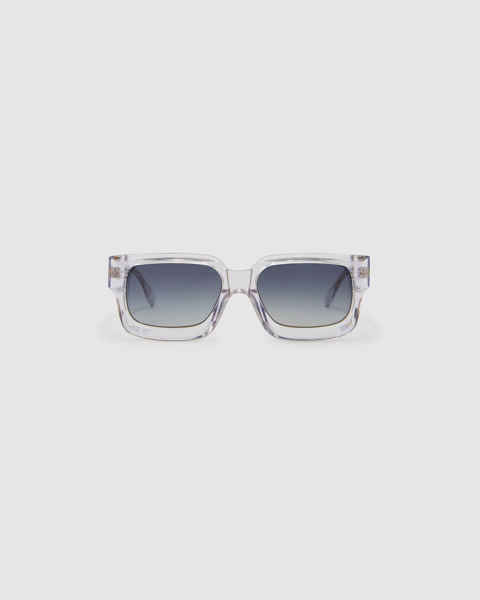 Brutal 3.0 Polarised Sunglasses by Tribu Eyewear — Crystal square acetate frame, front view light grey background.
