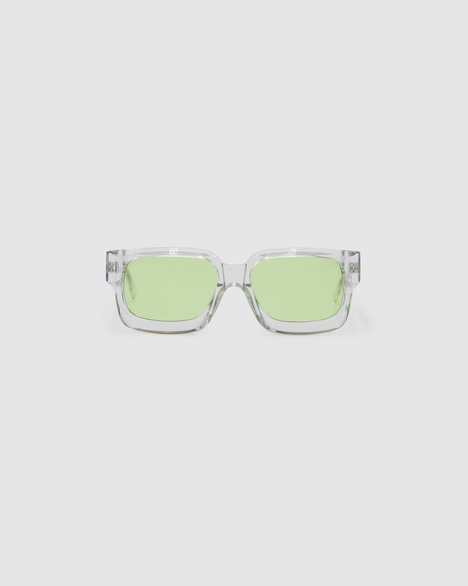 Brutal 3.0  Sunglasses by Tribu Eyewear — Crystal square acetate frame, sage lens, front view light grey background.