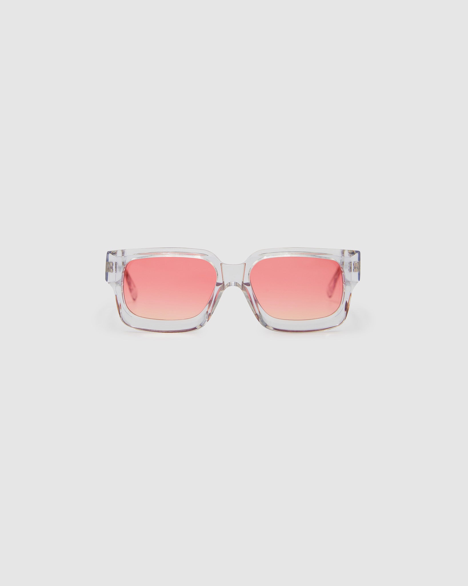 Brutal 3.0  Sunglasses by Tribu Eyewear — Crystal square acetate frame, sunset lens, front view light grey background.