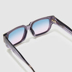 Brutal 3.0 Crystal Sunglasses by Tribu Eyewear — Smoke Crystal square acetate frame, Deep Ocean lens, detailed view light grey background.