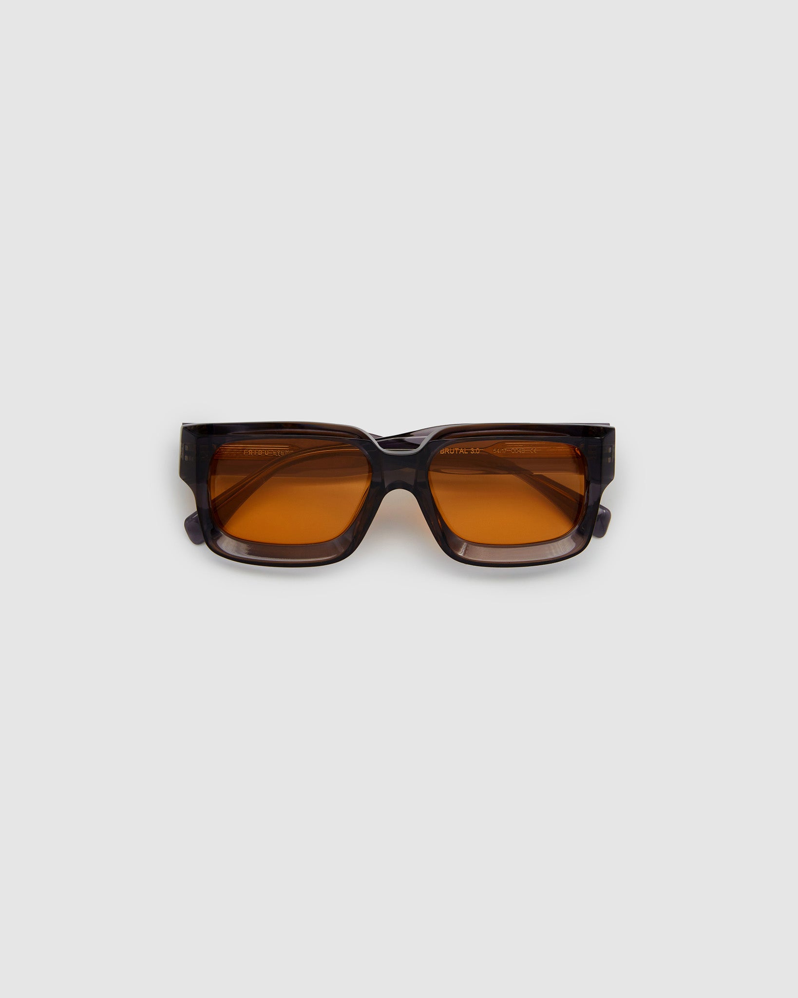 Brutal 3.0  Sunglasses by Tribu Eyewear — Smoke Crystal square acetate frame, desert orange lens, flat view light grey background.
