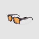 Brutal 3.0  Sunglasses by Tribu Eyewear — Smoke Crystal square acetate frame, desert orange lens, side view light grey background.