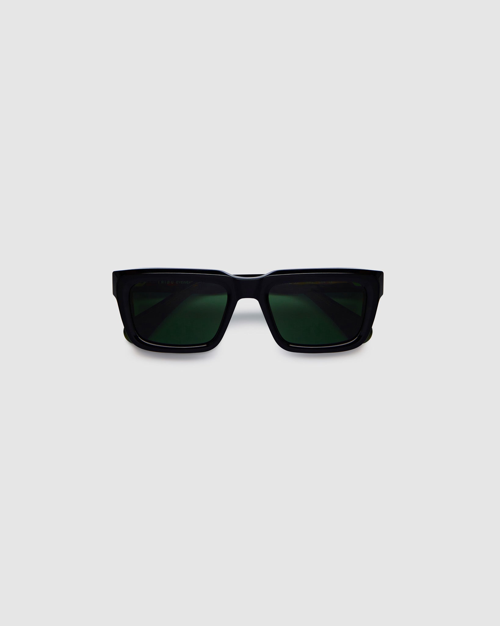 Brutal 5.0 Polarised Sunglasses by Tribu Eyewear — Black rectangular acetate frame, green lens, flat view light grey background.