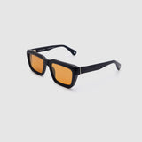 Brutal 5.0 Sunglasses by Tribu Eyewear — Matte black rectangular acetate frame, desert orange lens, side view light grey background.
