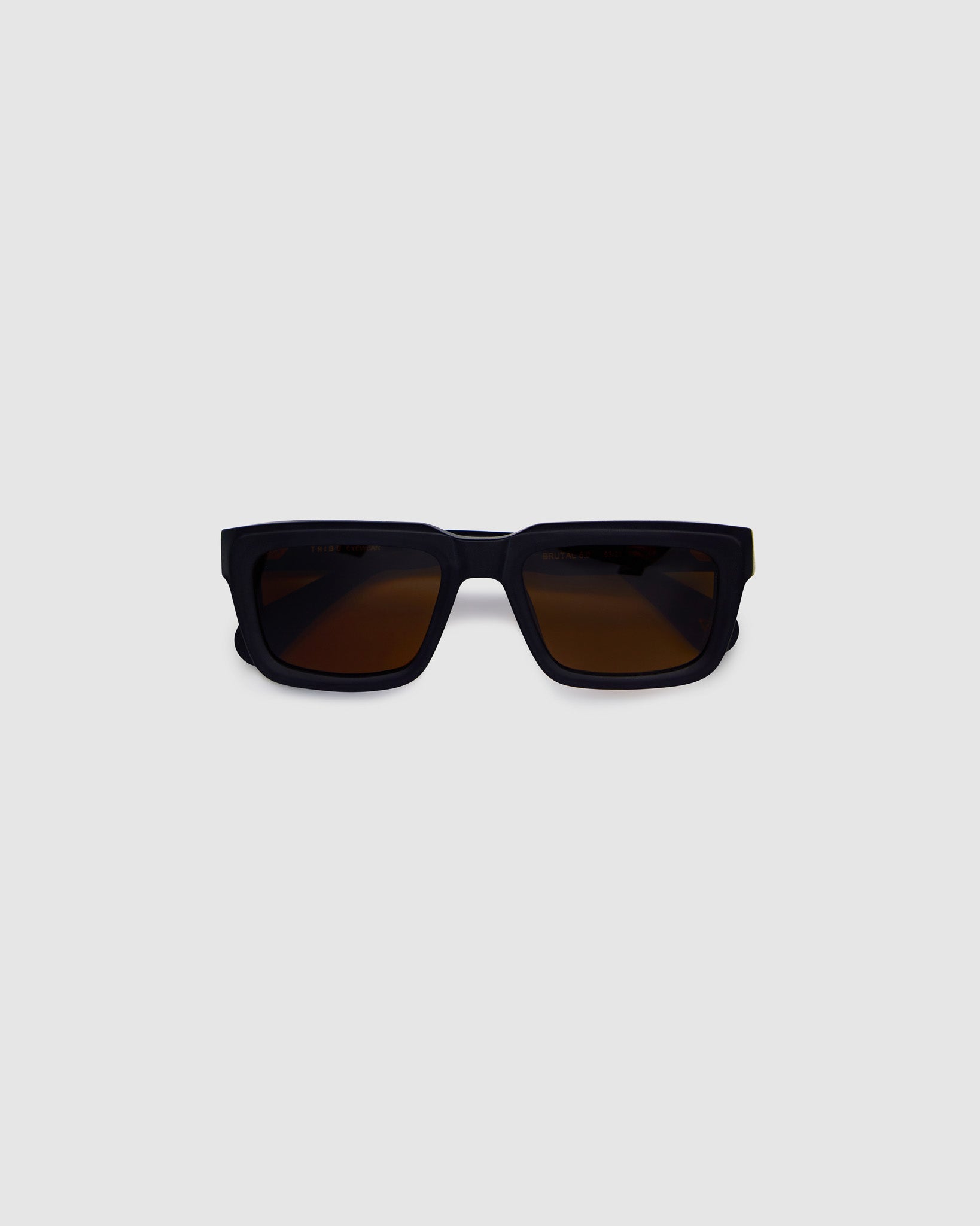 Brutal 5.0 Polarised Sunglasses by Tribu Eyewear — Matte Black rectangular acetate frame, brown lens, flat view light grey background.
