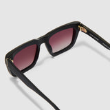 Brutal 5.0 Polarised Sunglasses by Tribu Eyewear — Matte Black rectangular acetate frame, rose grad lens, detailed view light grey background.