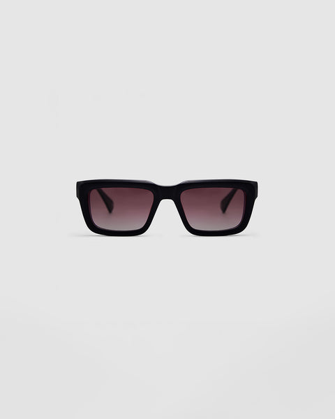 Brutal 5.0 Polarised Sunglasses by Tribu Eyewear — Matte Black rectangular acetate frame, rose grad lens, front view light grey background.