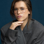 Fonda Brushed Gold Optical by Tribu Eyewear — Fine wire metal frame, on face studio view.