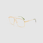 Fonda Brushed Gold Optical by Tribu Eyewear  —  Fine wire metal frame, side view studio lighting.