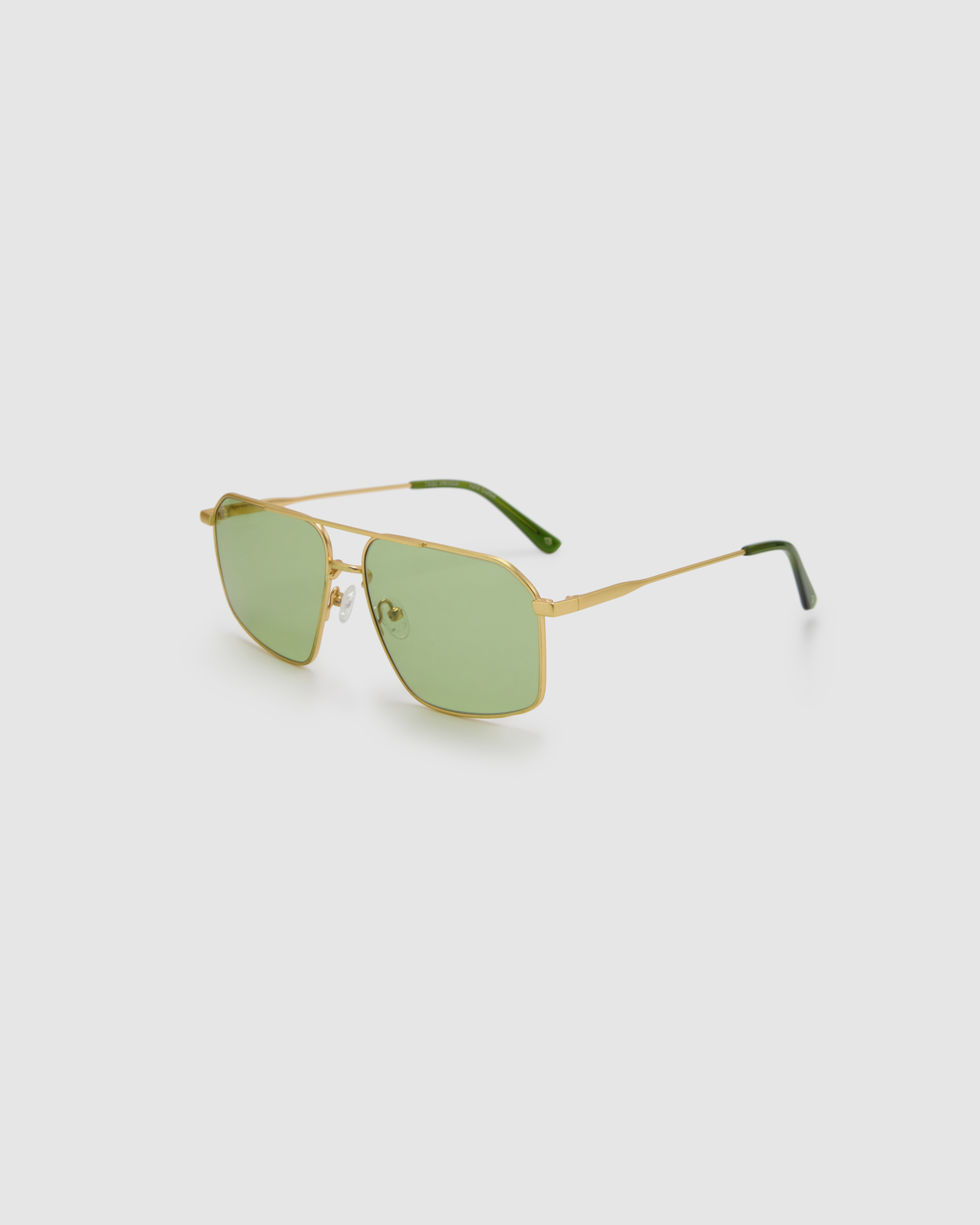 Fonda Gold Sunglasses by Tribu Eyewear  — Fine wire metal aviator frame, sage lens, side view on white background. 