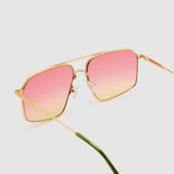 Fonda Gold Sunglasses by Tribu Eyewear  — Fine wire metal aviator frame, sunset tint lens, detailed view on white background. 