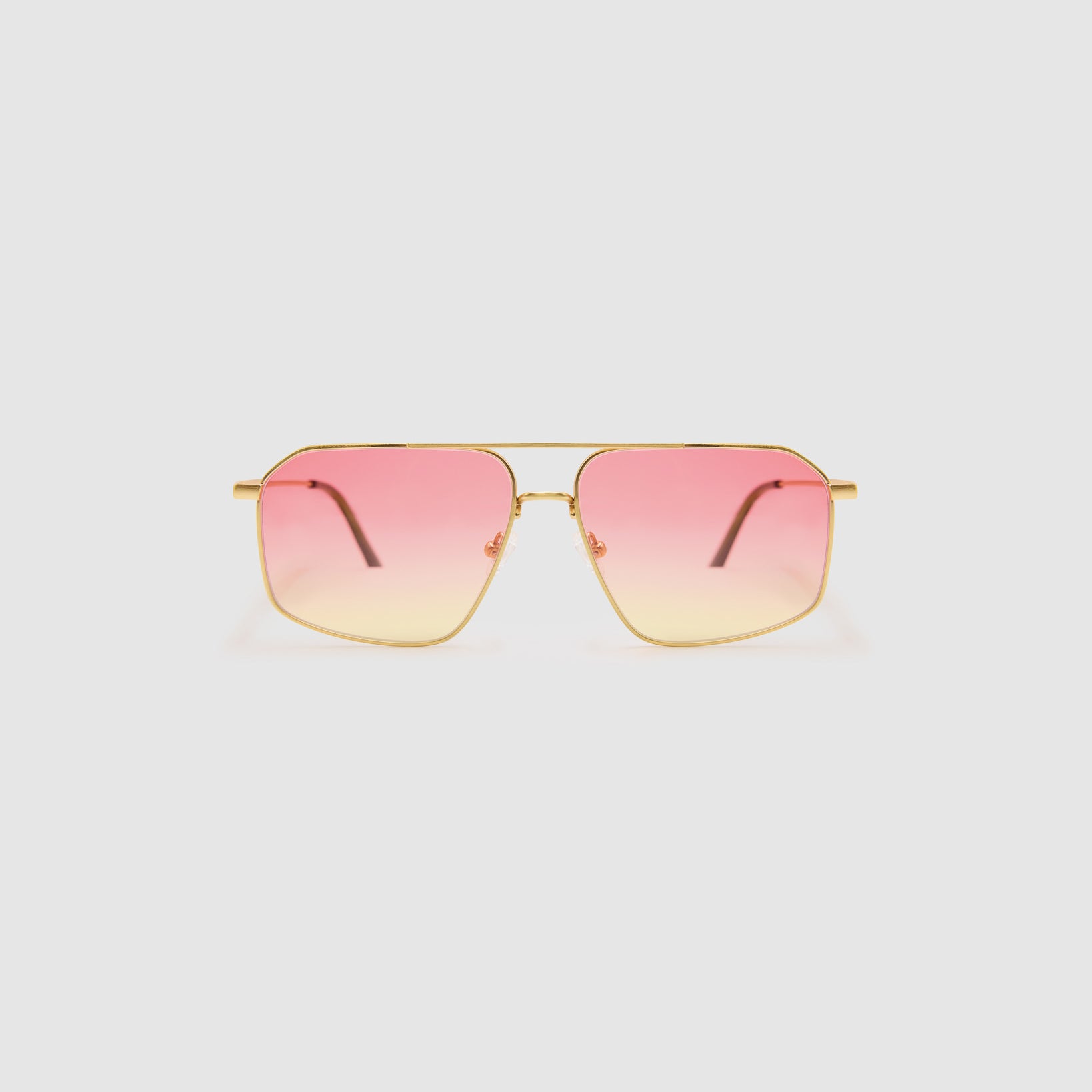Fonda Gold Sunglasses by Tribu Eyewear  — Fine wire metal aviator frame, sunset tint lens front view on white background. 