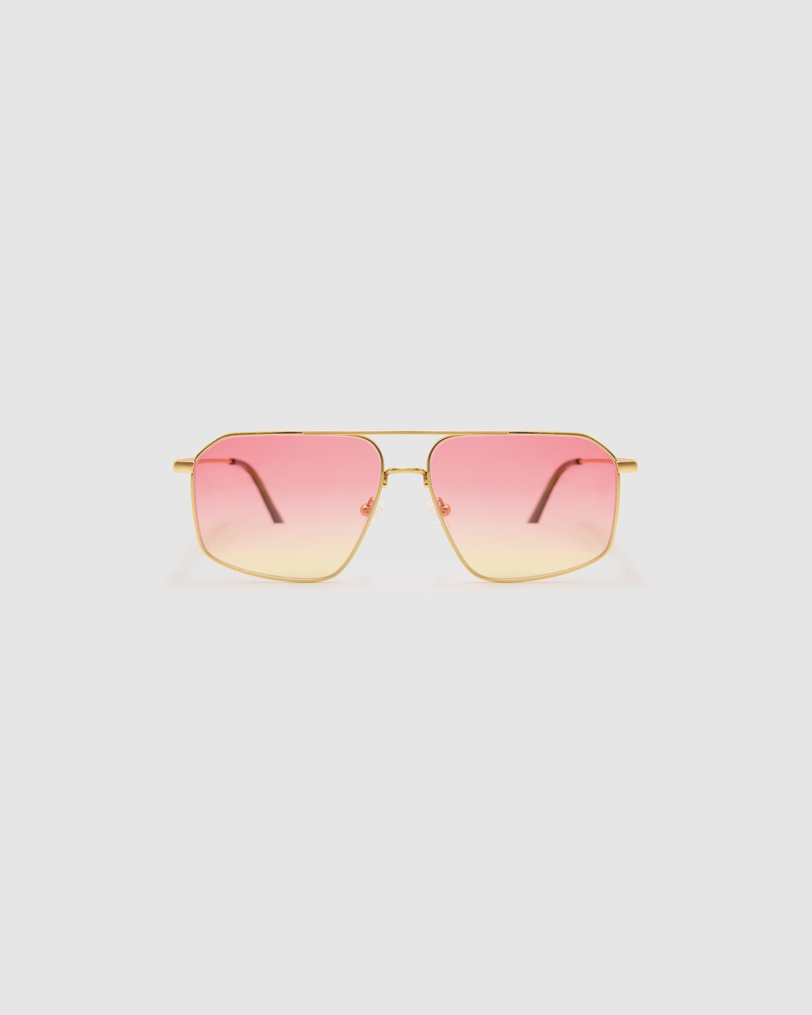Fonda Gold Sunglasses by Tribu Eyewear  — Fine wire metal aviator frame, sunset tint lens front view on white background. 