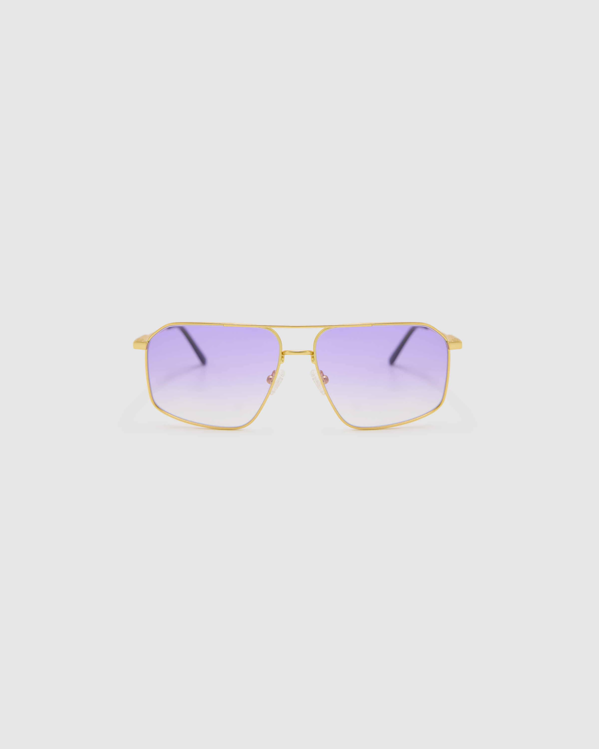 Fonda Gold Sunglasses by Tribu Eyewear  — Fine wire metal aviator frame, virgin violet lens, front view on white background. 