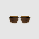 Fonda Sunglasses by Tribu Eyewear — Brown polarised lens in a gun metal aviator frame, flat view on a grey background.