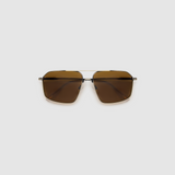 Fonda Sunglasses by Tribu Eyewear — Brown polarised lens in a gun metal aviator frame, flat view on a grey background.