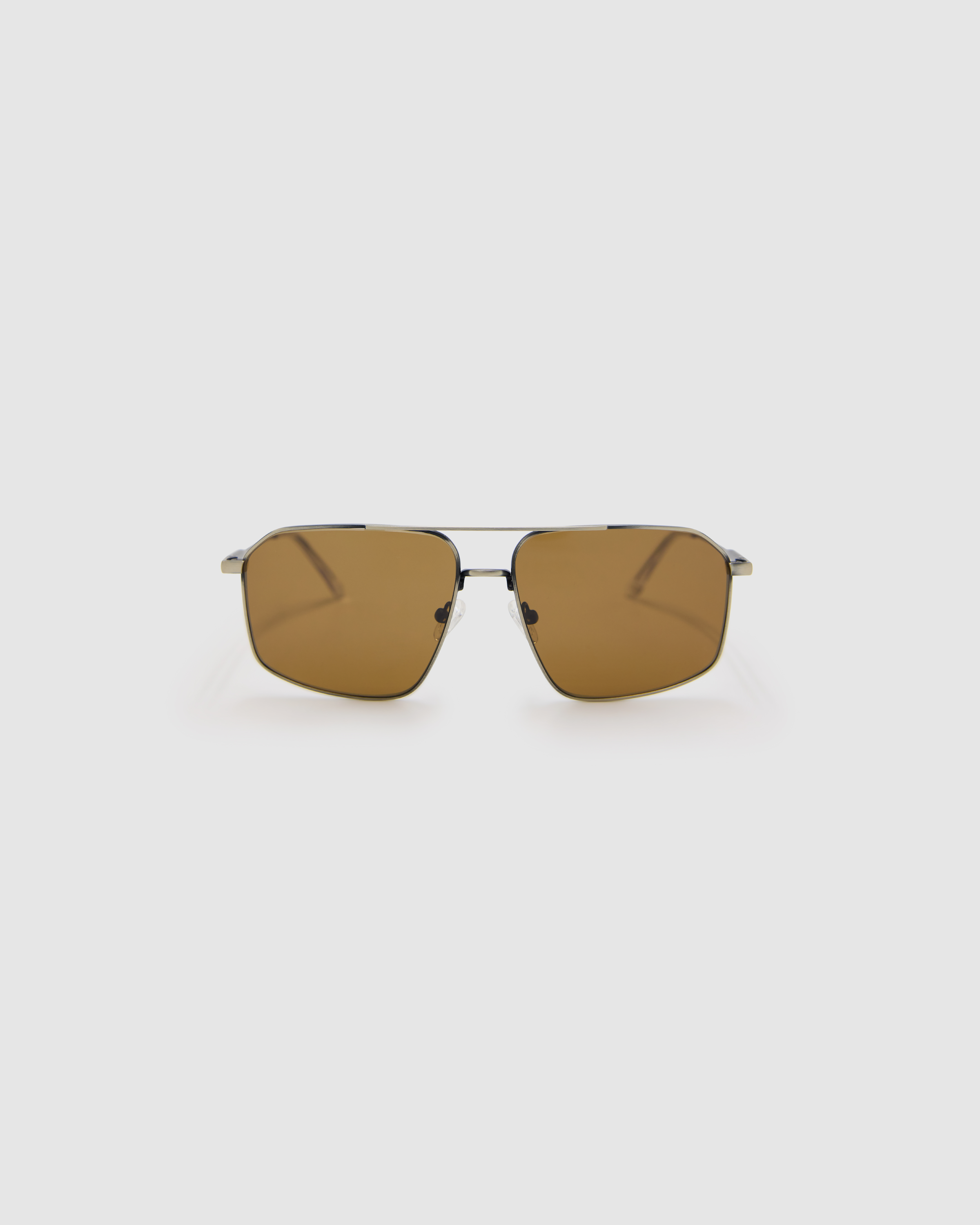 Fonda Sunglasses by Tribu Eyewear — Brown polarised lens in a gun metal aviator frame, front view on a grey background.
