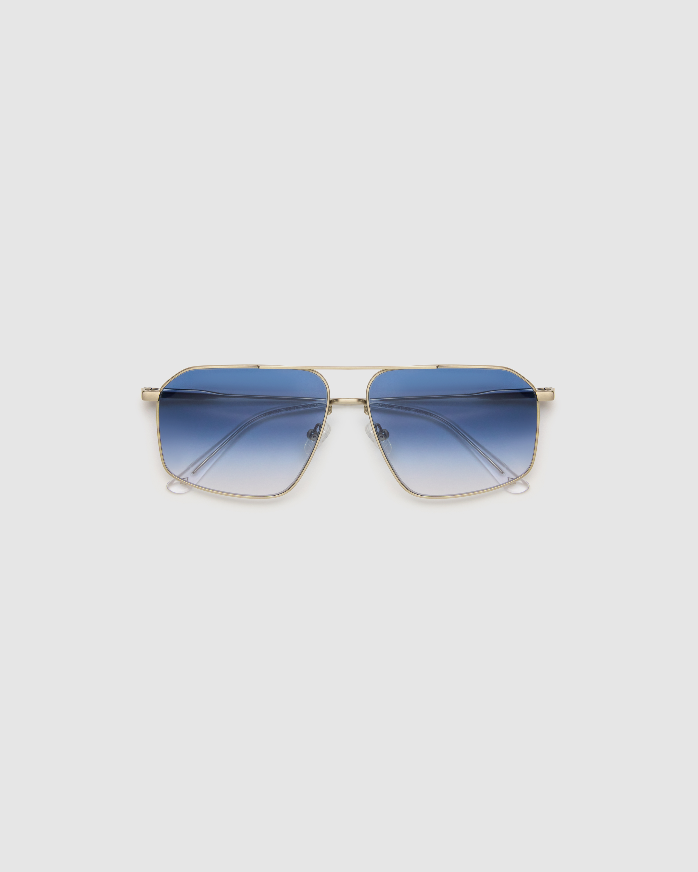 Fonda Silver Sunglasses by Tribu Eyewear  — Fine wire metal aviator frame, blue sky lens, flat view on white background.