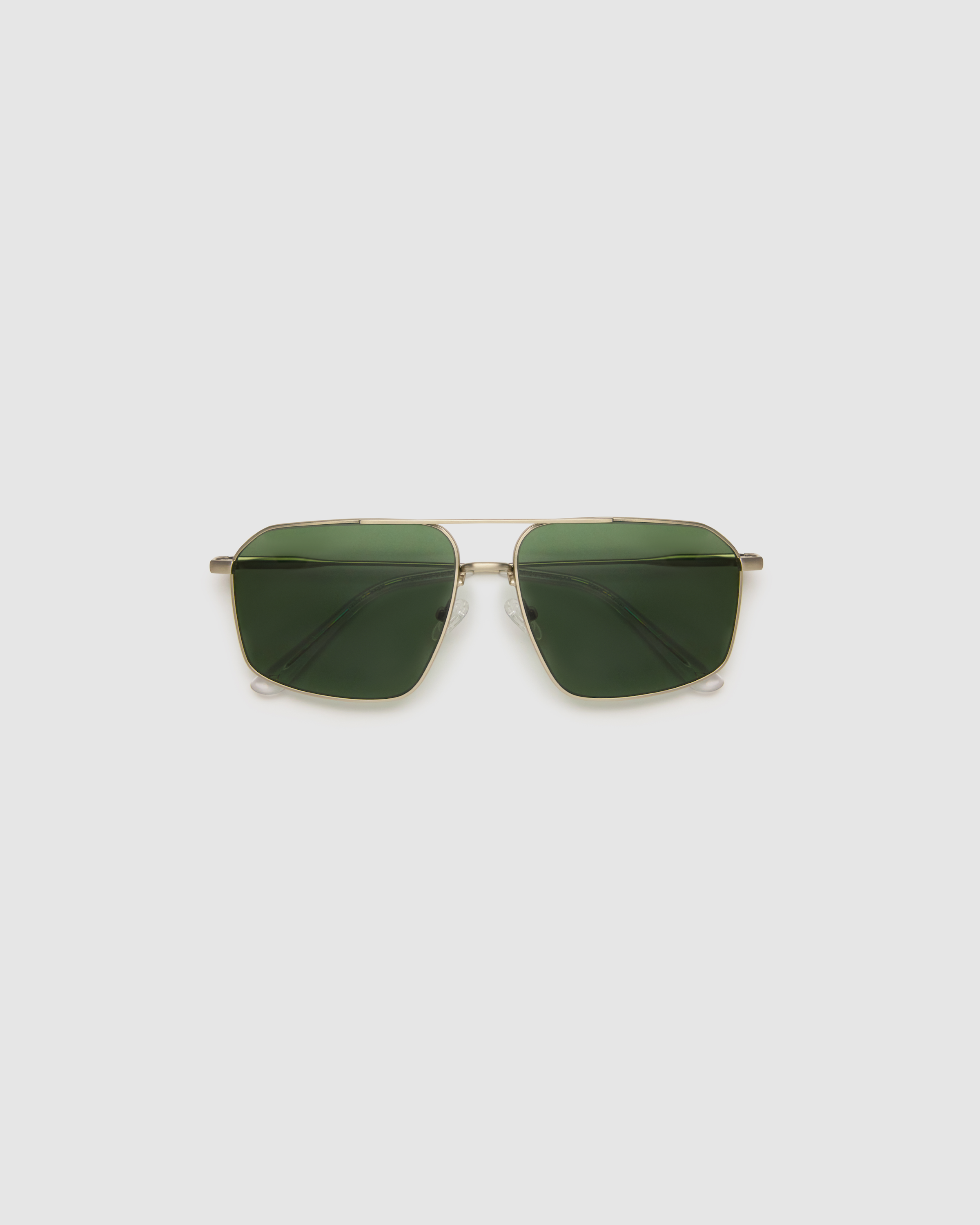 Fonda Sunglasses by Tribu Eyewear — Green polarised lens in a Silver metal aviator frame, flat view on a grey background.