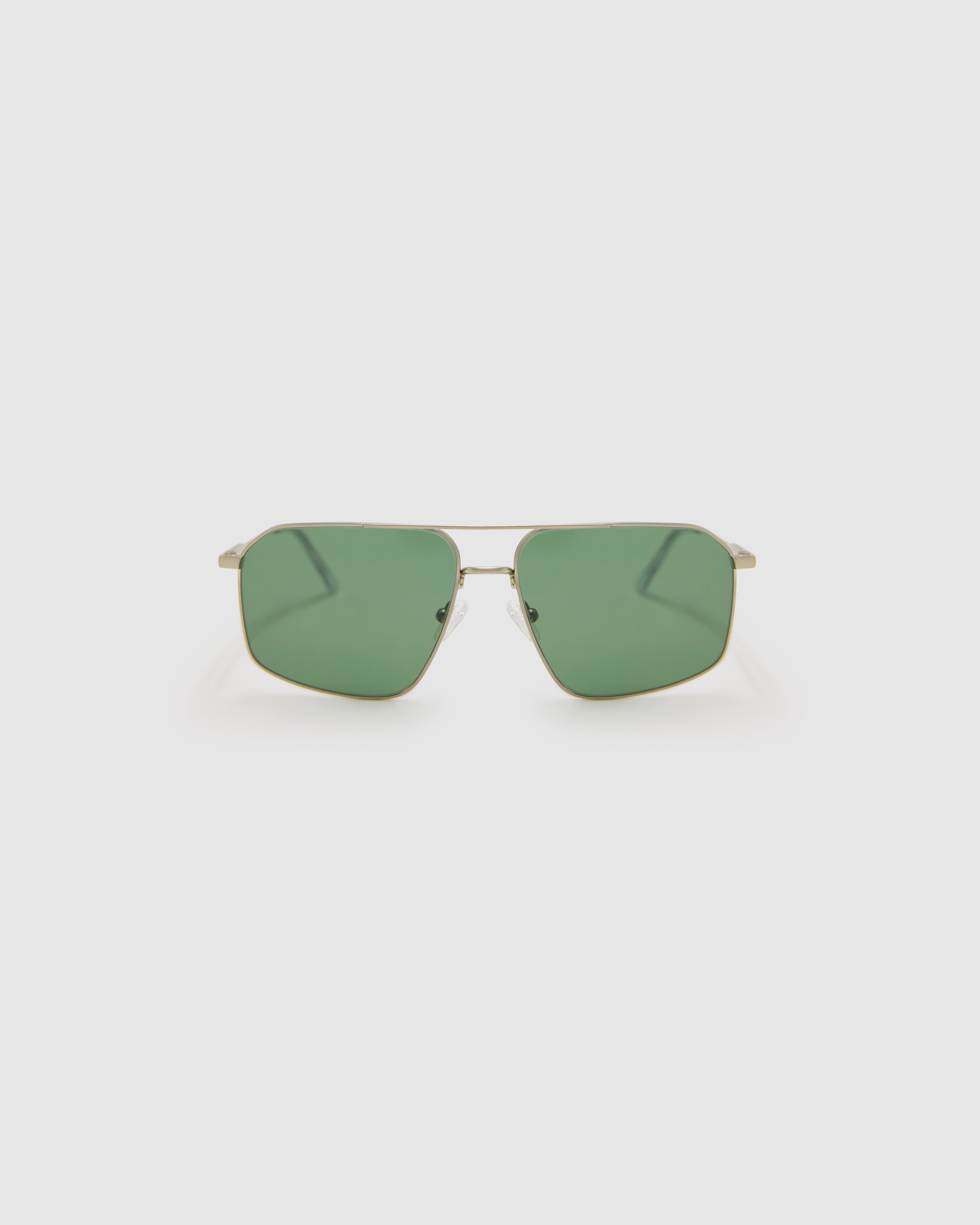 Fonda Sunglasses by Tribu Eyewear — Green polarised lens in a Silver metal aviator frame, front view on a grey background.