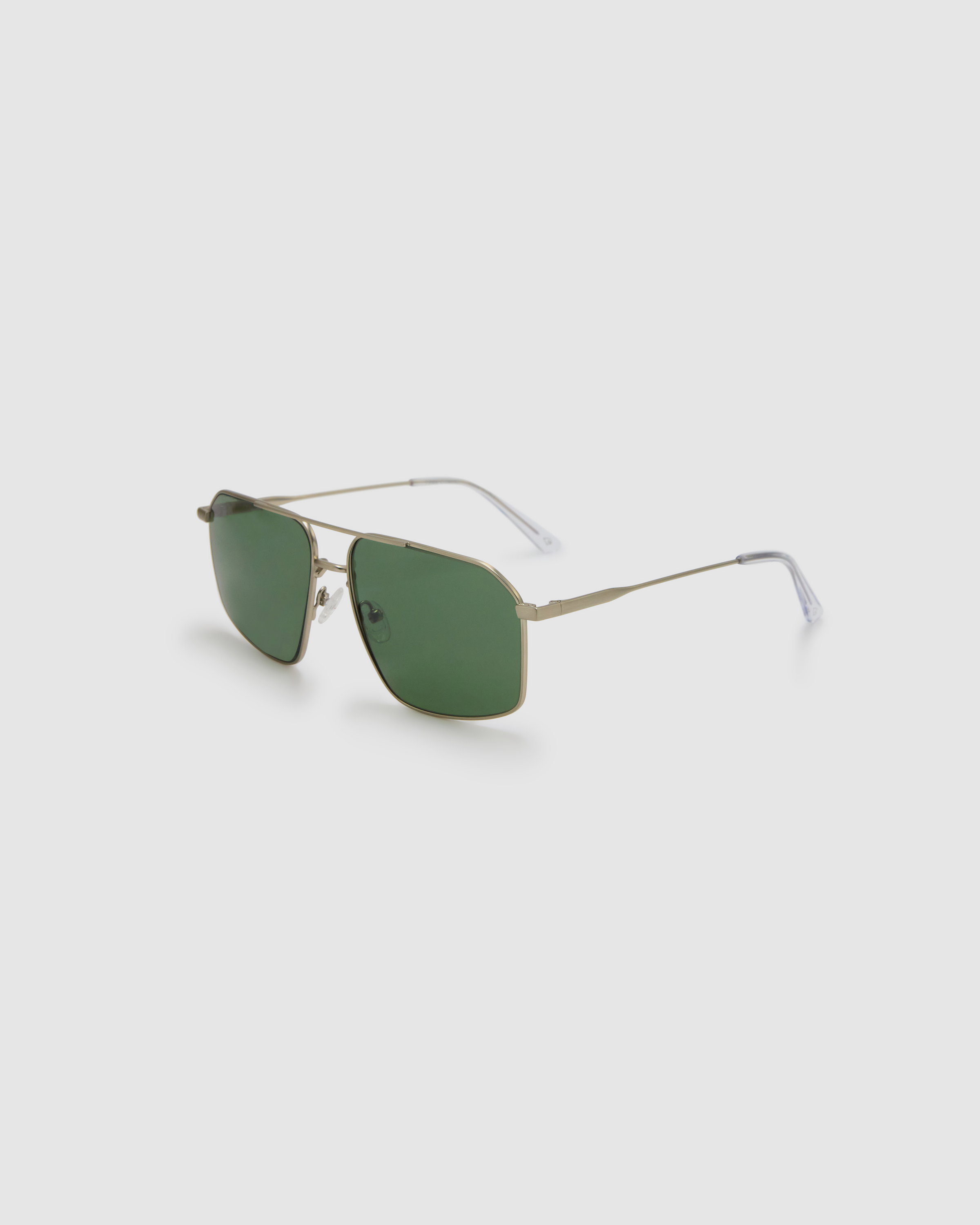 Fonda Sunglasses by Tribu Eyewear — Green polarised lens in a Silver metal aviator frame, side view on a grey background.