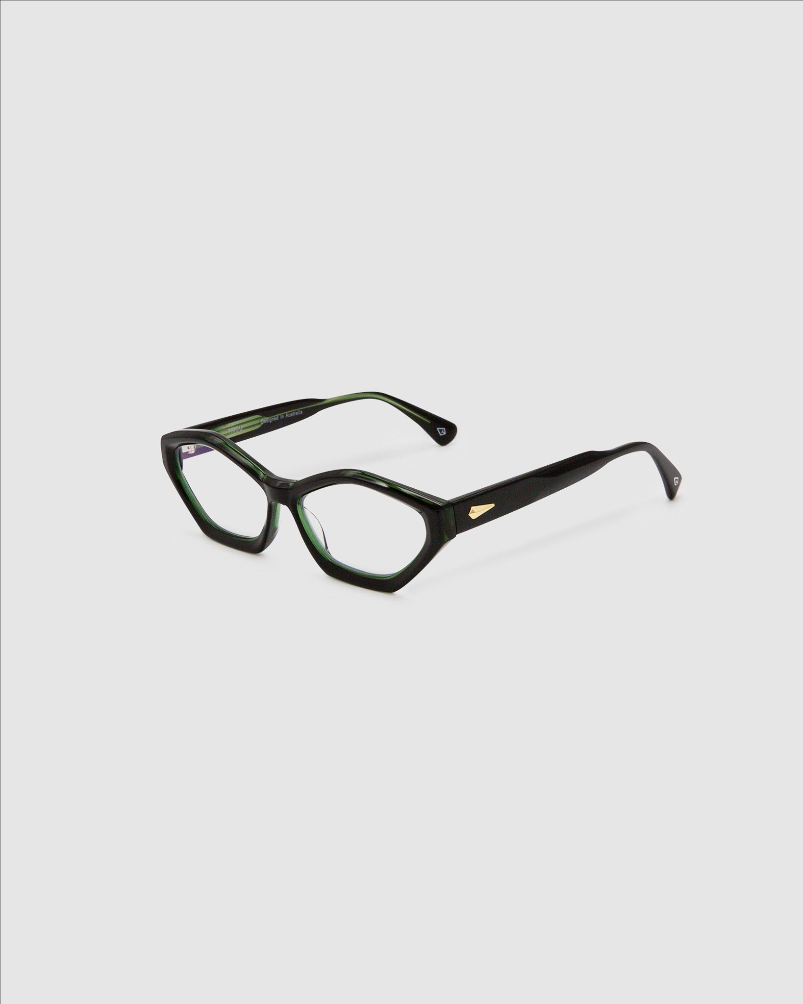 Franky Optical  by Tribu Eyewear — Black on Green Cat-eye optical frame, side view studio lighting. 