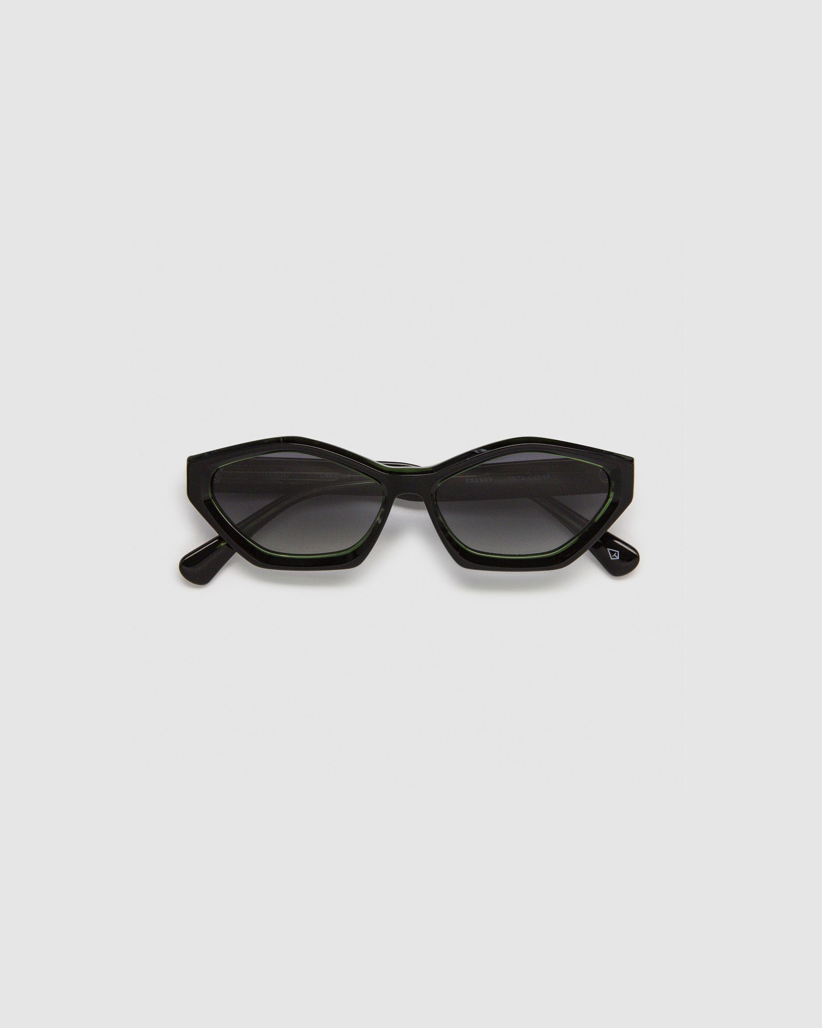 Franky Polarised Sunglasses by Tribu Eyewear — Black on Green Acetate Cat-eye frame with grey lens, flat view grey background.