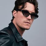 Franky Polarised Sunglasses by Tribu Eyewear — Black on Green Acetate Cat-eye frame with grey lens, front male model grey background.