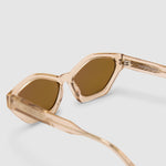 Franky Polarised Sunglasses by Tribu Eyewear — Champagne Crystal Cat-eye brown lens, detailed view, grey background.