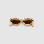 Franky Polarised Sunglasses by Tribu Eyewear — Champagne Crystal Cat-eye brown lens, flat view, grey background.