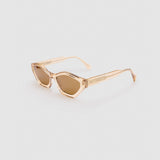 Franky Polarised Sunglasses by Tribu Eyewear — Champagne Crystal Cat-eye brown lens, side view, grey background.