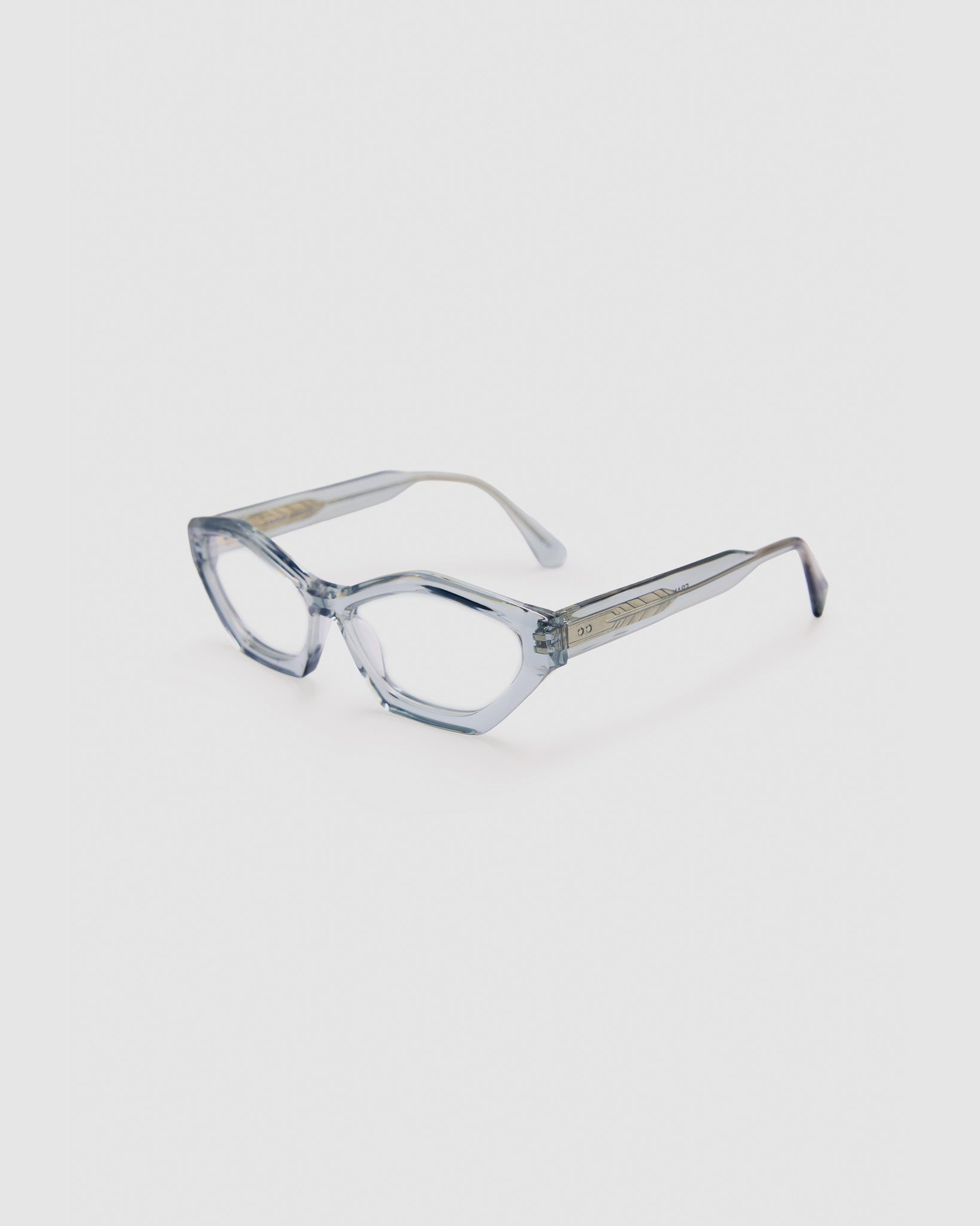 Franky Optical  by Tribu Eyewear — Champagne Cat-eye optical frame, side view studio lighting. 