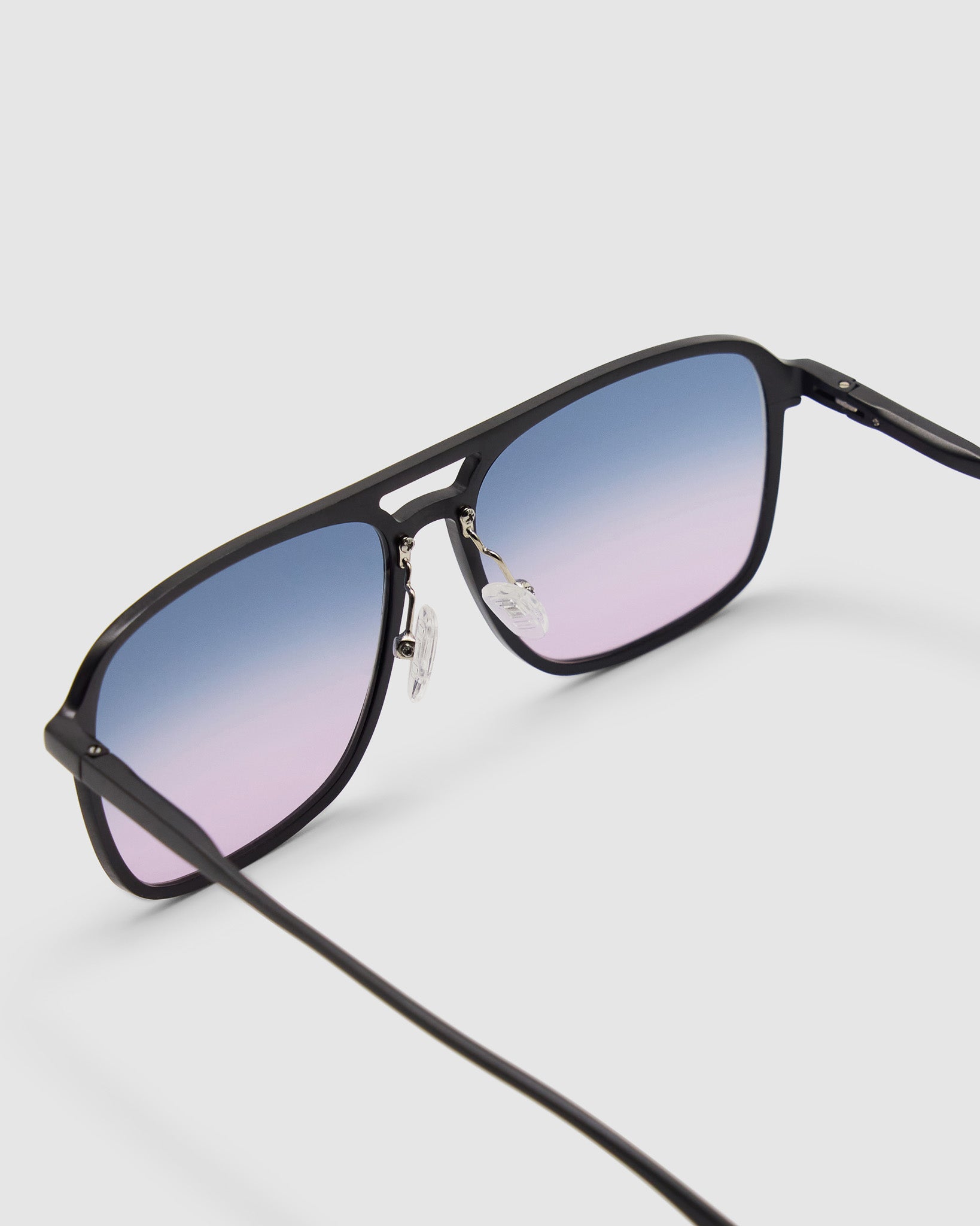 Oscar Sunglasses by Tribu Eyewear — Black Aluminium Aviator frame, Deep Ocean lens detailed view.