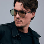 Oscar Sunglasses by Tribu Eyewear — Black Aluminium Aviator frame, Sage lens male model. 