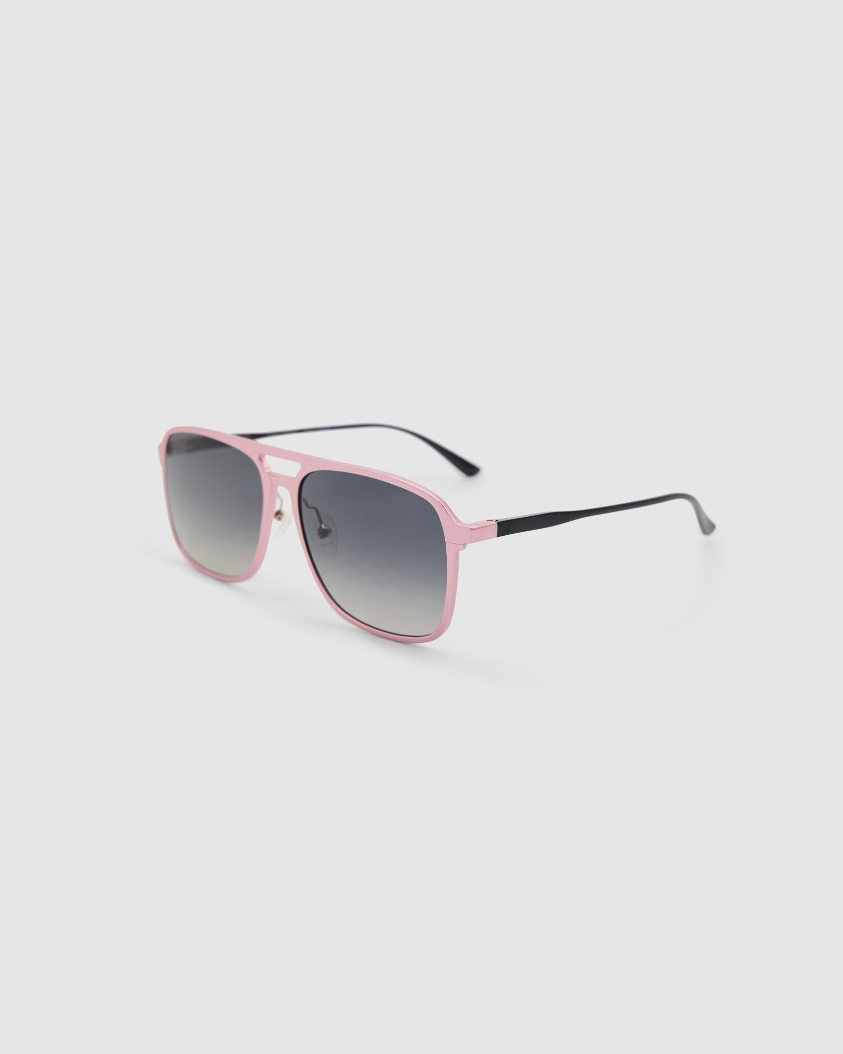 Oscar Sunglasses  by Tribu Eyewear — Metallic pink aluminium aviator, grey grad polarised lens, side view on grey background. 