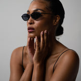 Model wearing TRIBU Nardi Black Cat-eye sunglasses