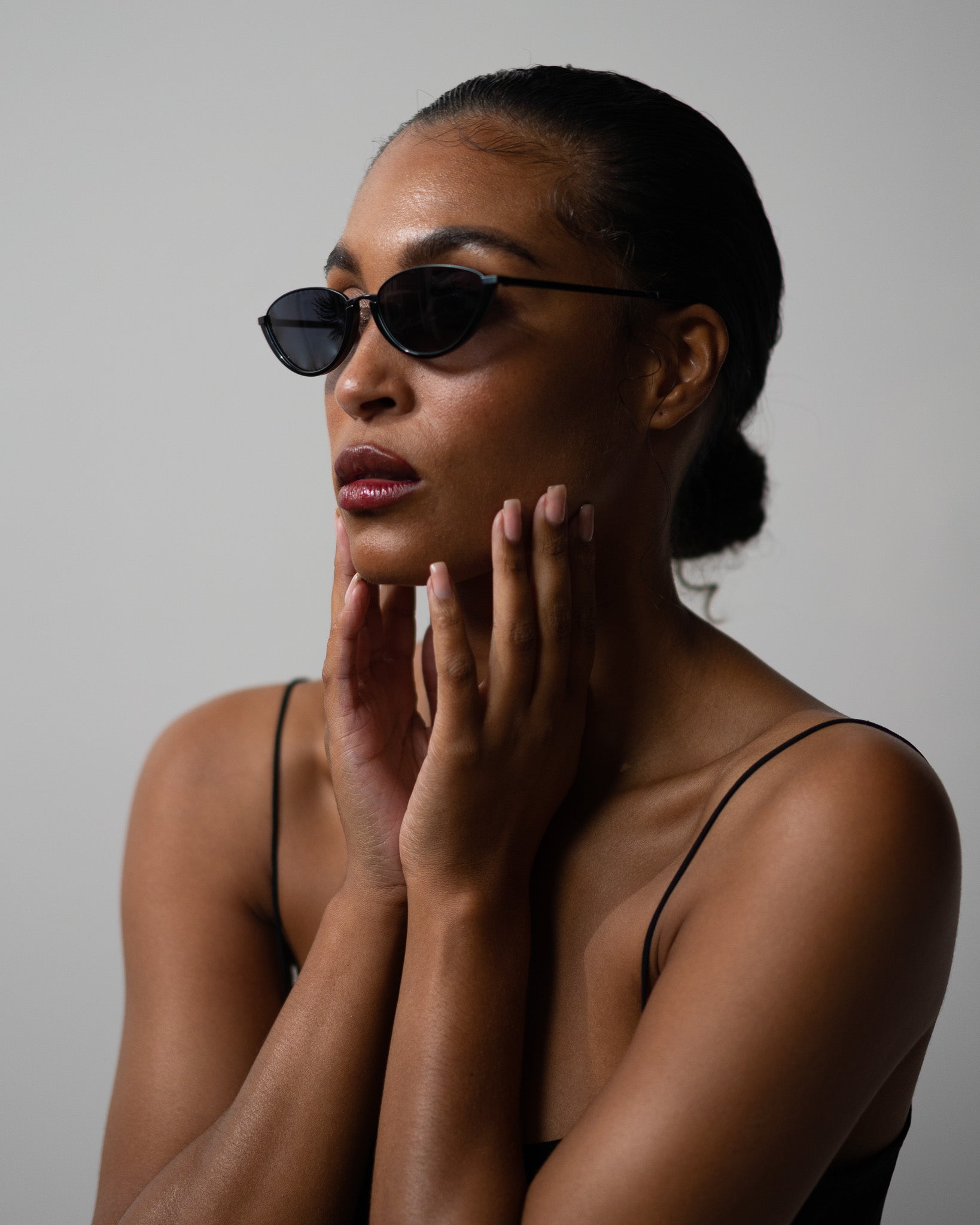 Model wearing TRIBU Nardi Black Cat-eye sunglasses