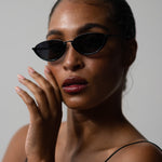 Model wearing TRIBU Nardi Black cat-eye sunglasses  
